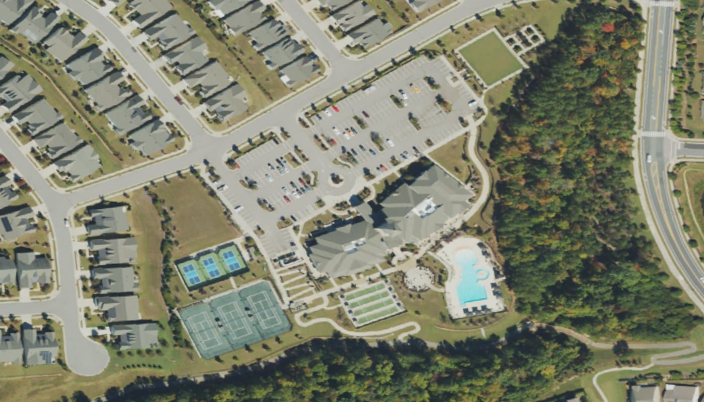 Aerial photograph of the clubhouse and amenities at Carolina Arbors