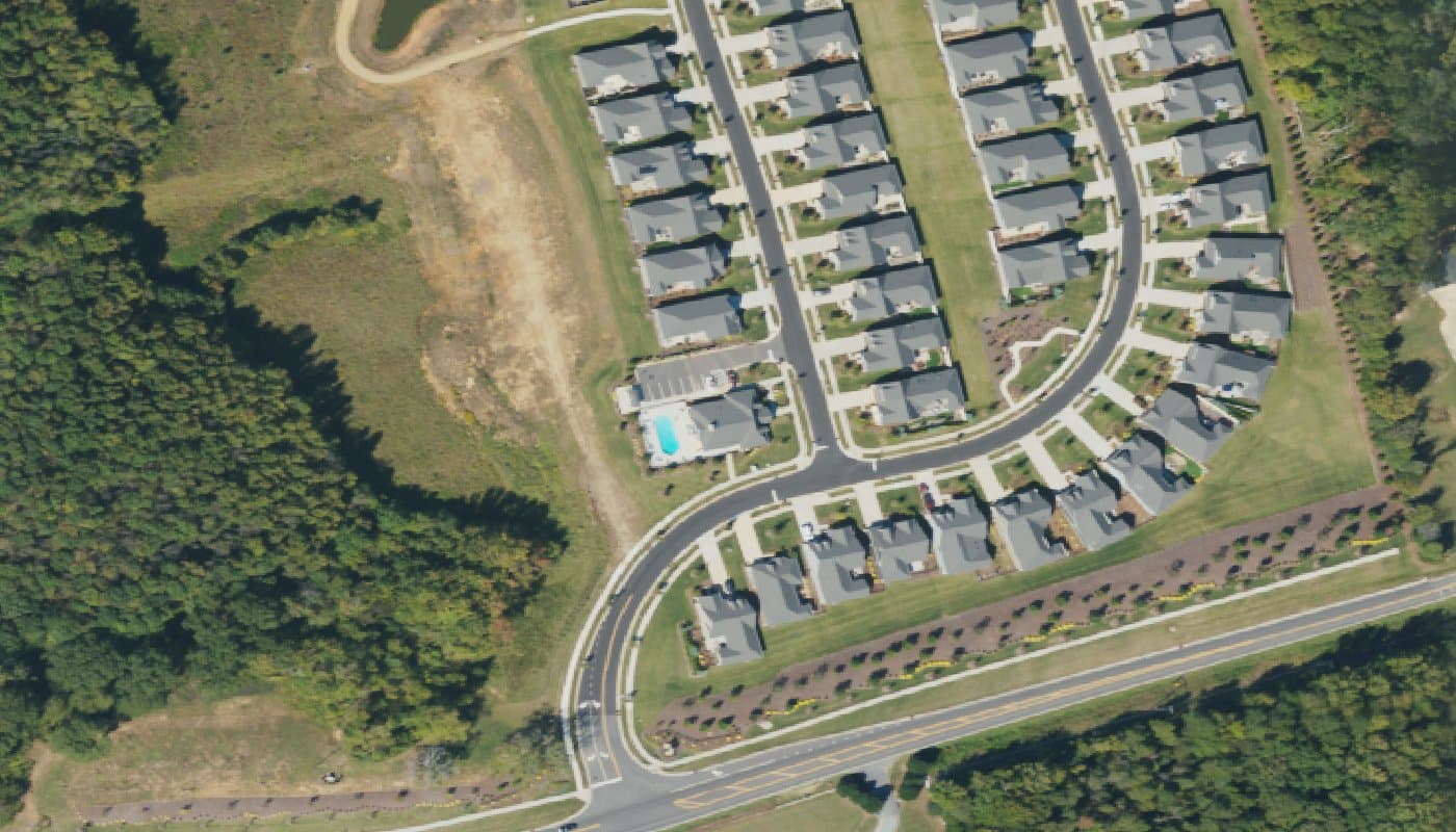 Aerial photograph of the clubhouse and amenities at The Courtyards on Poplar Tent