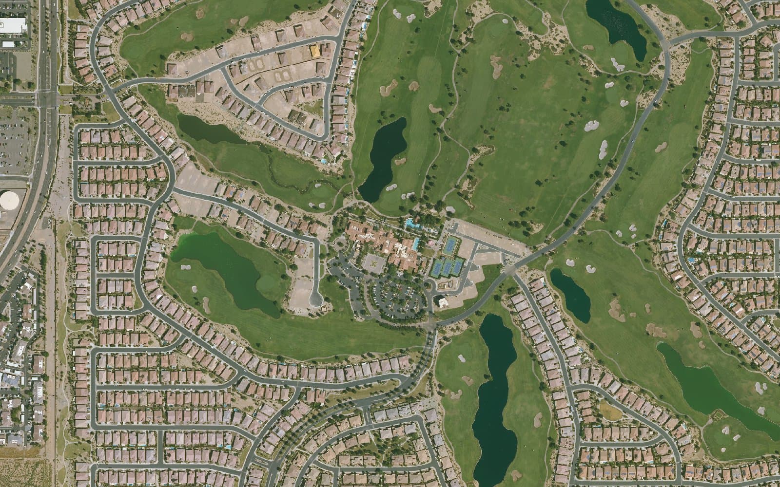 Aerial photograph of Encanterra, a Trilogy Resort Community and the surrounding area