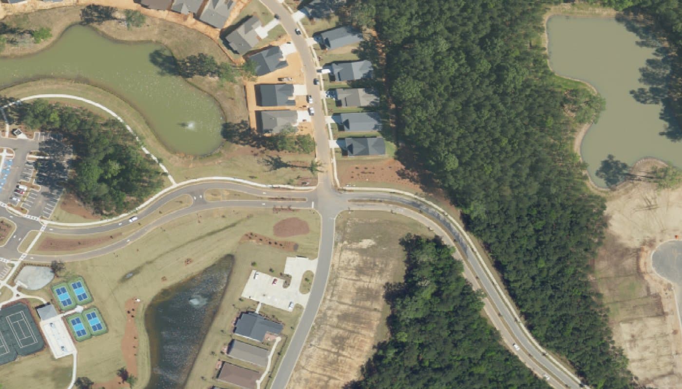Aerial photograph of the clubhouse and amenities at Four Seasons at Carolina Oaks