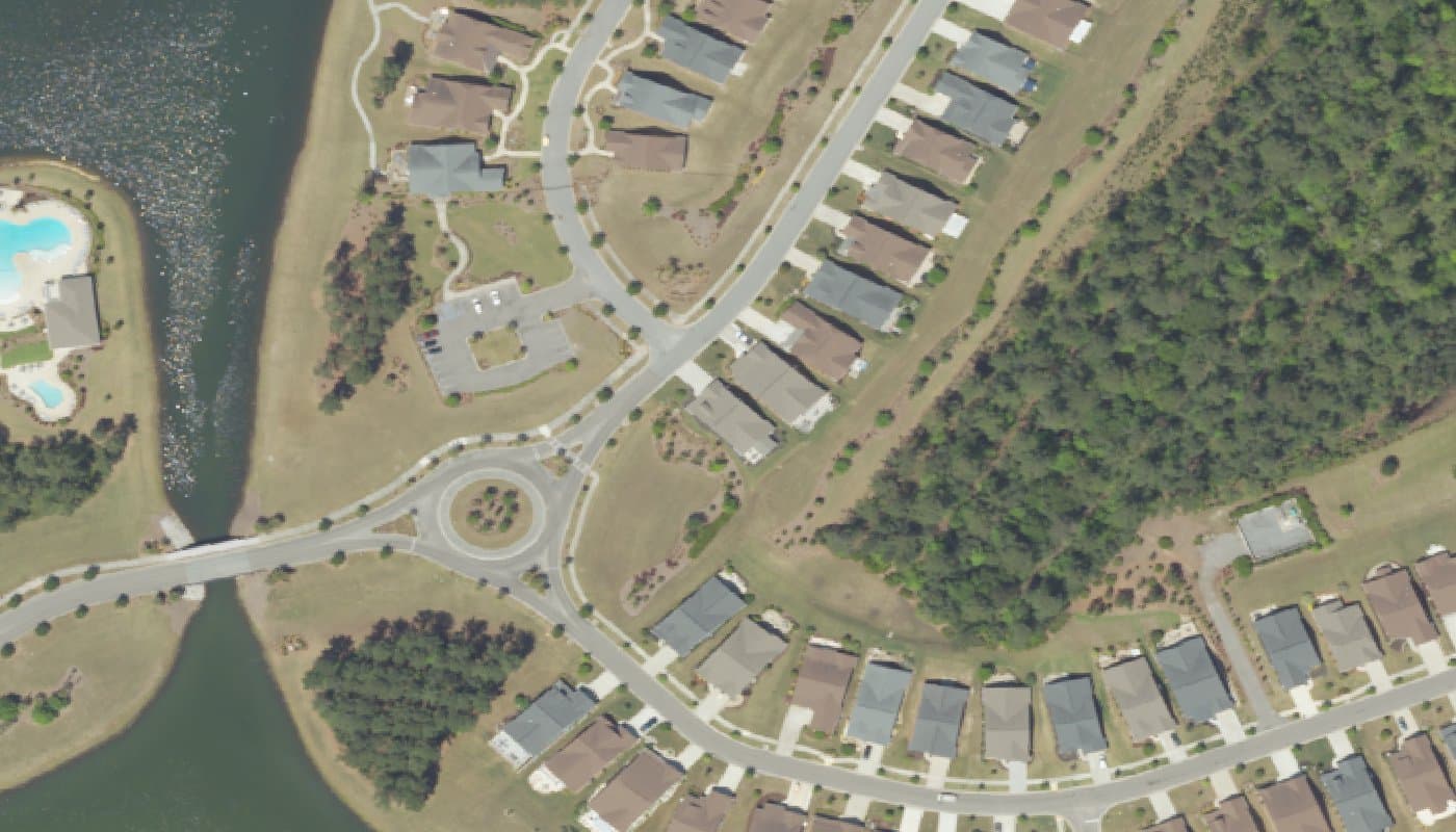 Aerial photograph of the clubhouse and amenities at K. Hovnanian's Four Seasons at Lakes of Cane Bay