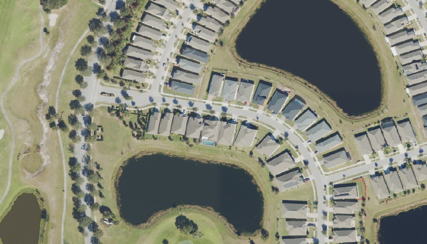 Aerial photograph of the clubhouse and amenities at The Lakes at Harmony