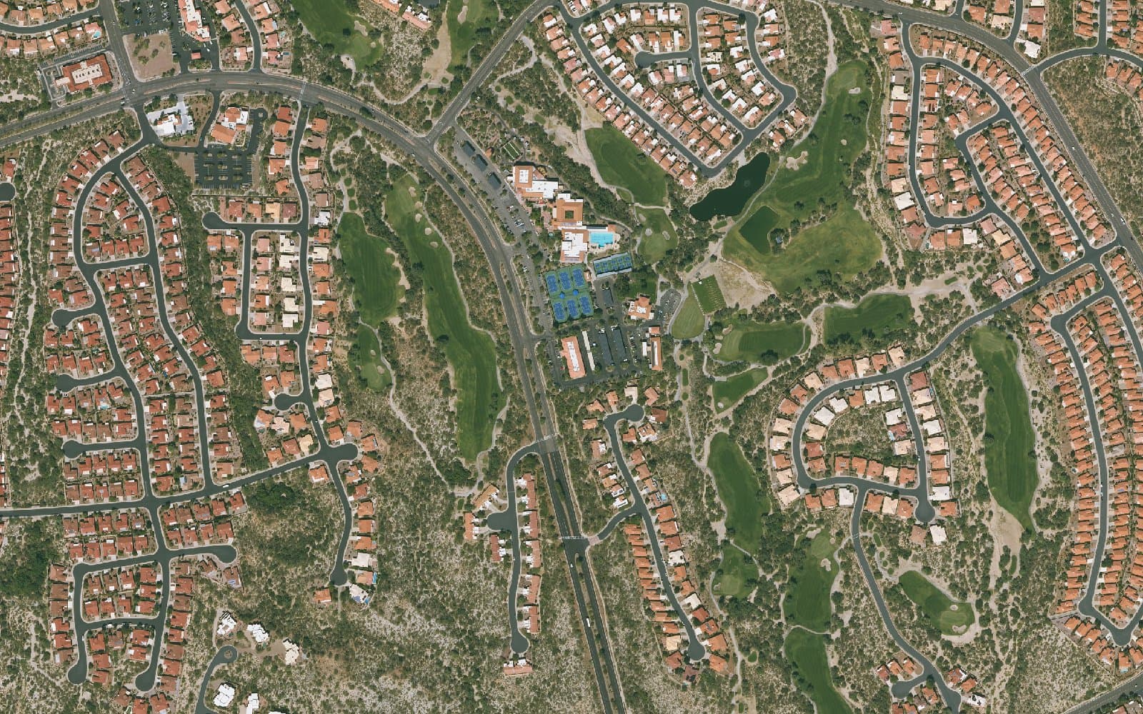 Aerial photograph of Sun City Oro Valley and the surrounding area