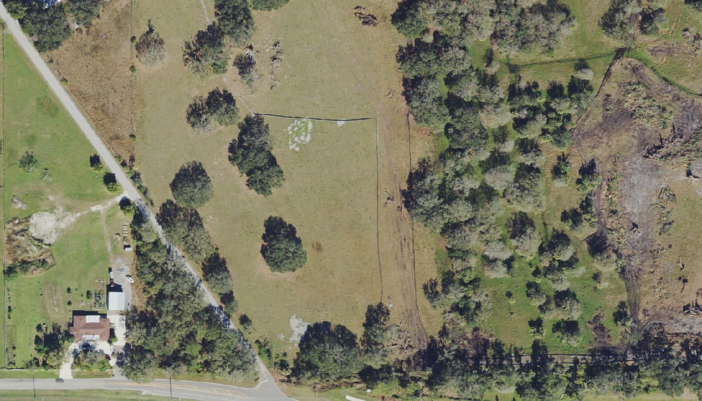 Aerial photograph of the clubhouse and amenities at Woodland Preserve